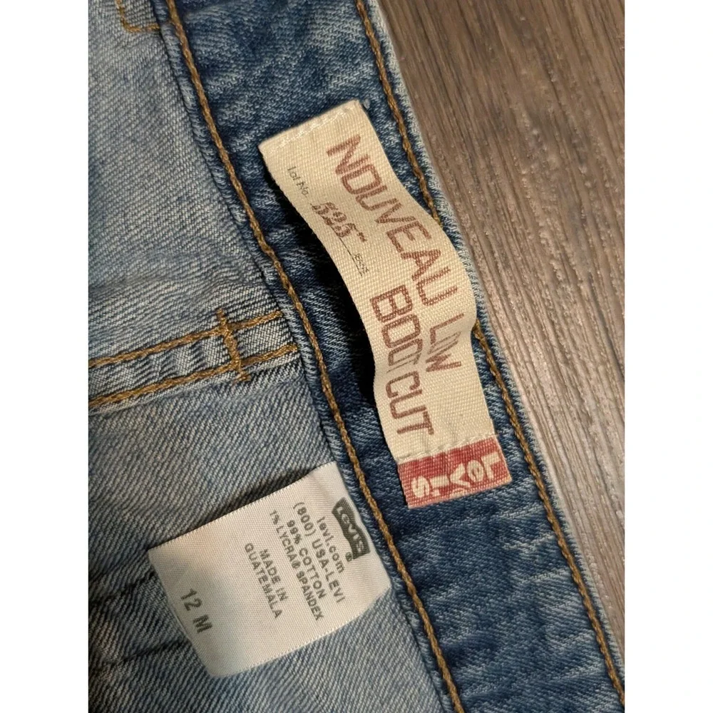Levis 525 Nouveau Low Bootcut Jeans Womens 12M Medium Wash Blue Denim Stretch